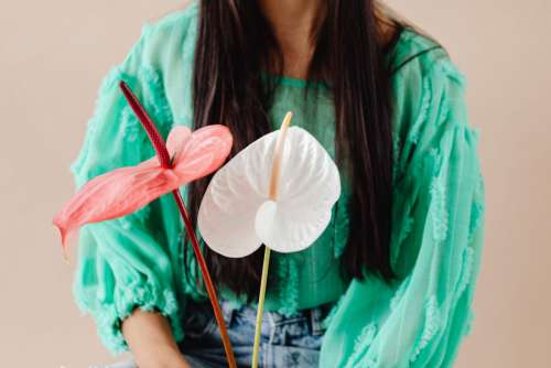 A Beautiful Young Mixed Race Girl with Anthurium Flower