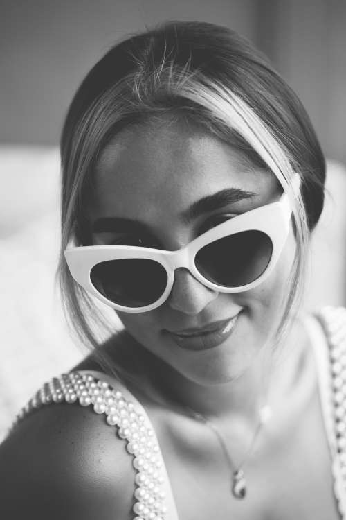 Portrait In Monochrome Of Woman In Sunglasses Photo
