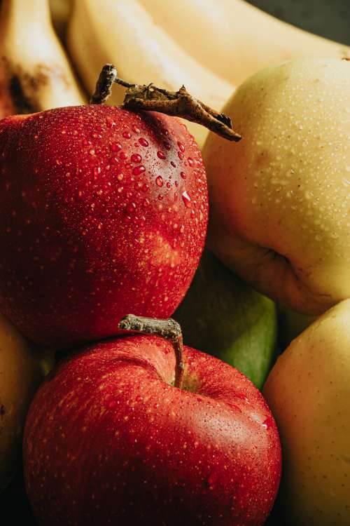 Red And Yellow Apples Covered With Water Droplets Photo