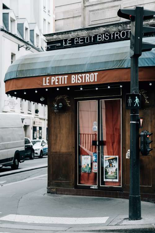 Entrance To A Restaurant On A Street Corner Photo