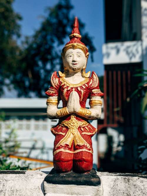 Red And Gold Statue Outdoors Photo