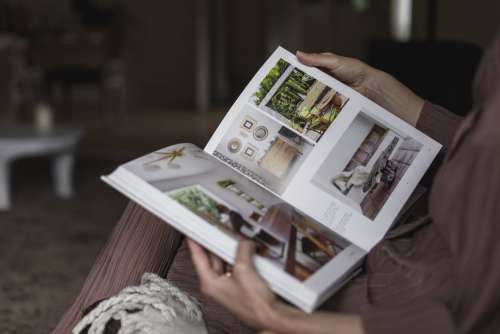 Person Holds Open An Interior Design Book Photo