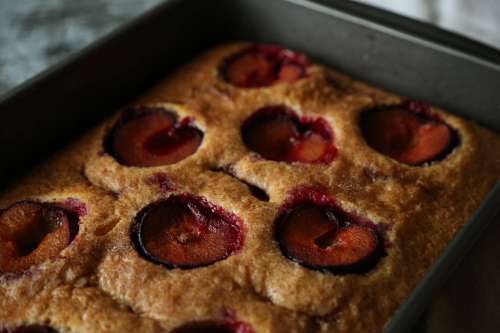 Plum Cake In A Silver Cake Tray Photo
