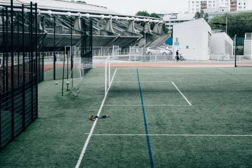 Empty Net On A Green Sports Field In The City Photo