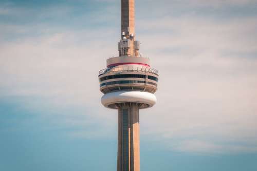The Middle Of The Cn Tower Against A Blue Sky Photo