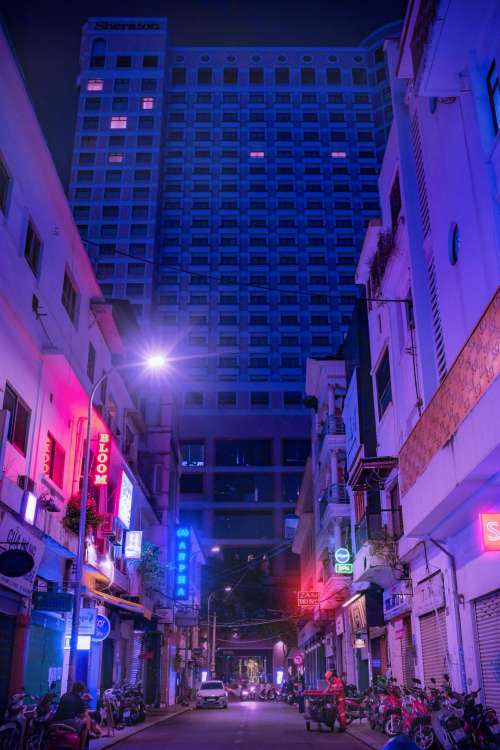Busy City Street In Blue And Pink Light Photo