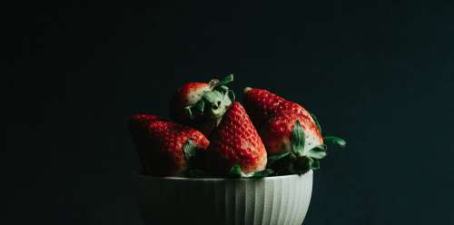 Ripe Red Strawberries In A White Bowl Photo