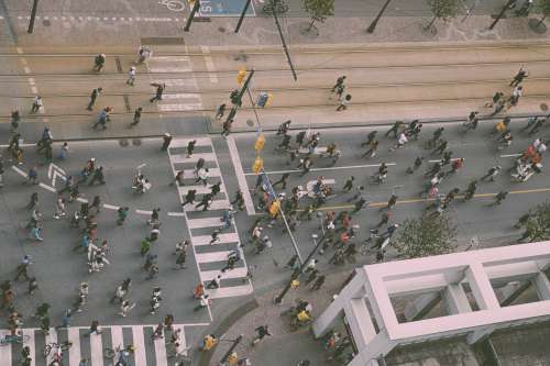 Aerial Photo Of Crowd Walking On A City Street Photo