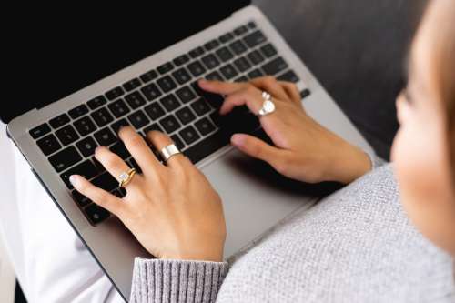 Photo Of A Person Typing On Their Laptop Photo