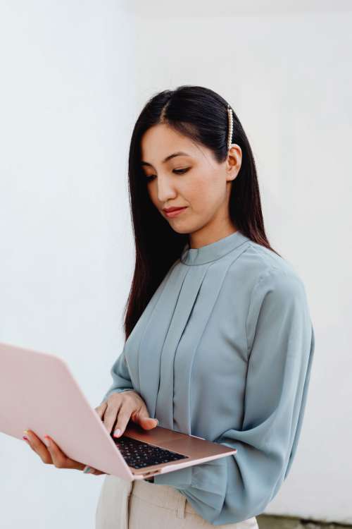 Young Asian Woman At Office