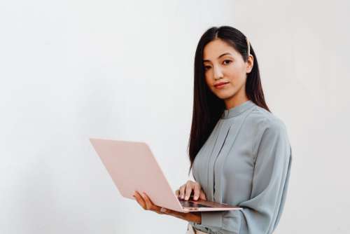 Young Asian Woman At Office