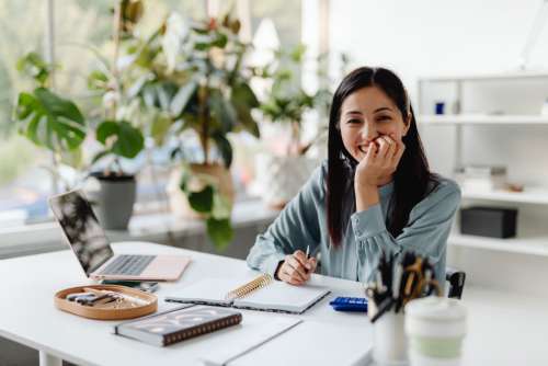 Young Asian Woman At Office