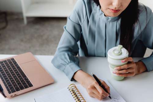 Young Asian Woman At Office