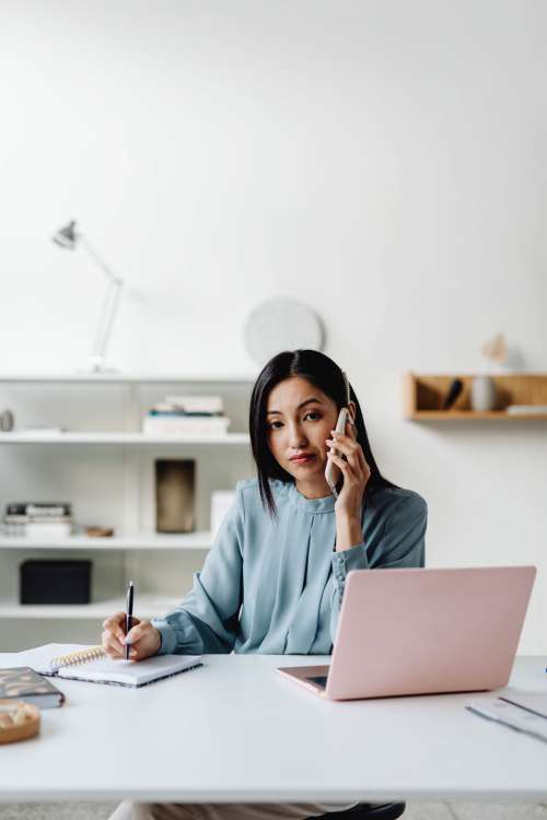 Young Asian Woman At Office