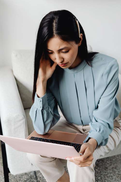 Young Asian Woman At Office