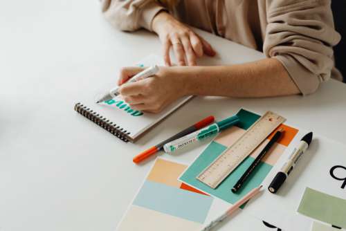 Graphic designer at work in her office