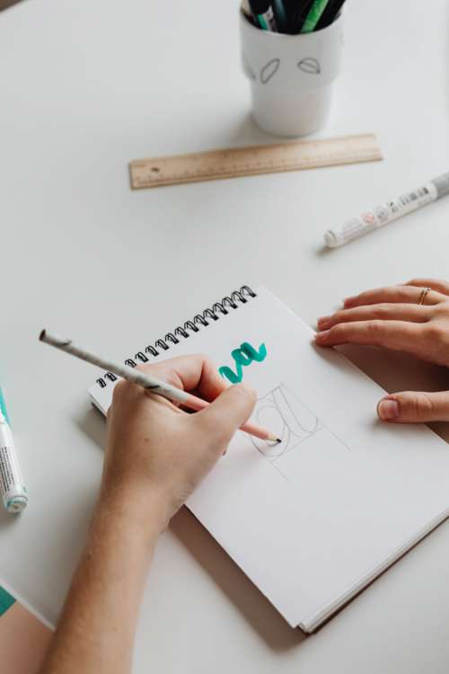 Graphic designer at work in her office