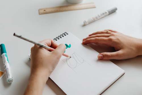 Graphic designer at work in her office