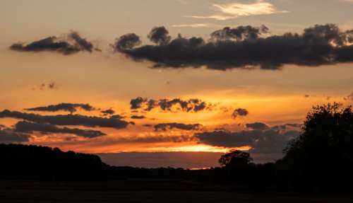 Cloudy Sunset Landscape Free Photo