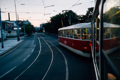 Street With Wires Above And A Street Car To The Right Photo