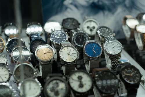 Variety Of Watches Lined Up In Rows Photo