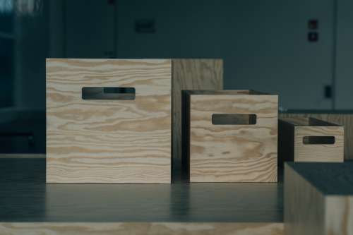 Wooden Boxes In All Sizes On A Table Photo