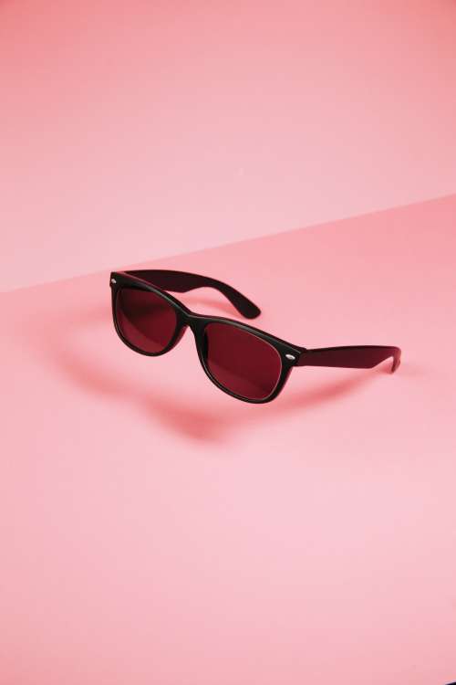 Black Sunglasses On Pink Photo