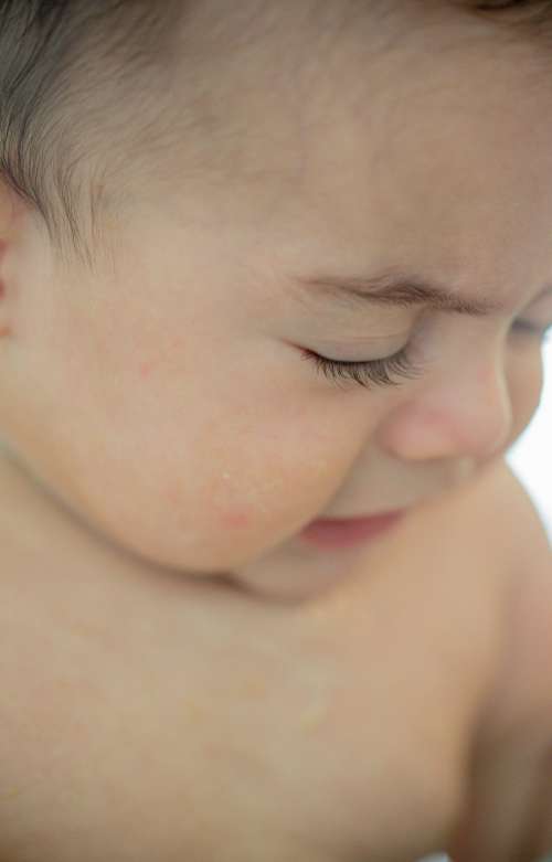 Close Up Of A Toddlers Round Face Photo