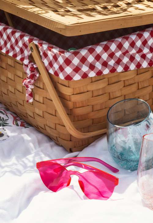 Wicker Picnic Basket With Stemless Wine Glasses Photo