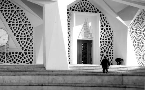 Geometric Entrance To A Large Mosque In Black And White Photo