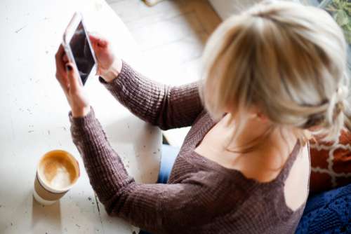 Woman Browsing Smartphone No Cost Stock Image