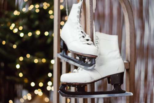 Vintage ice skates on a wooden sled 2