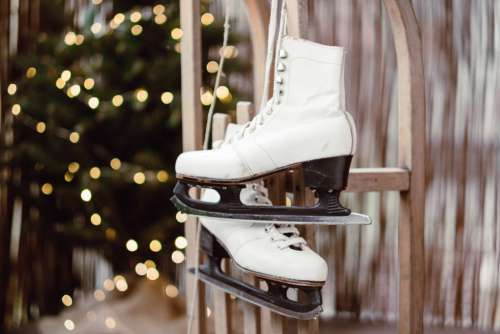 Vintage ice skates on a wooden sled 3