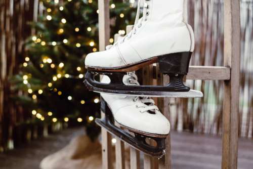 Vintage ice skates on a wooden sled 4