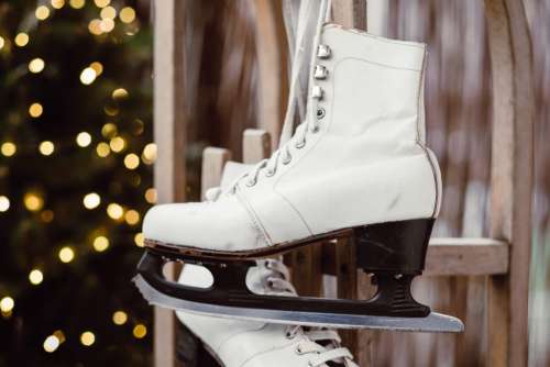 Vintage ice skates on a wooden sled 5