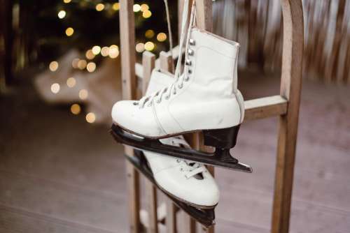 Vintage ice skates on a wooden sled 6