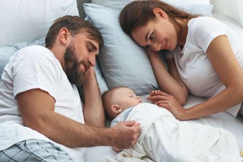 Parents Baby Bed No Cost Stock Image