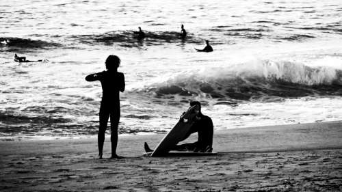 Ocean Surfers Beach No Cost Stock Image