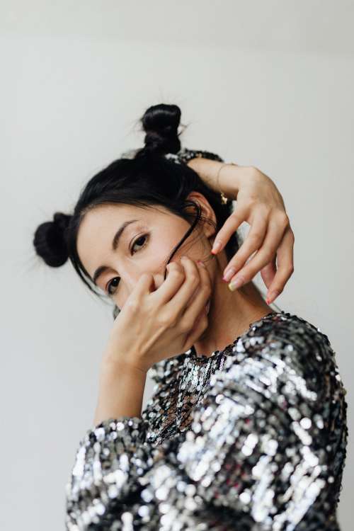 Futuristic photo shoot - beautiful Asian model - silver - neon colors - holographic