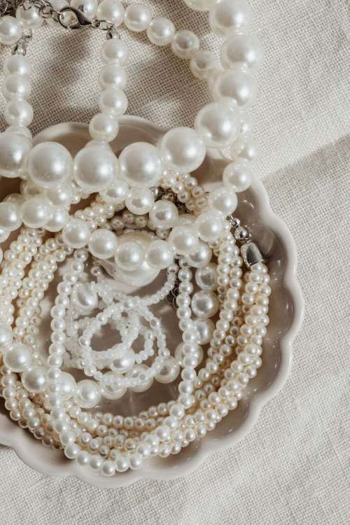 Pearl jewelry - backgrounds - flatlays - from above