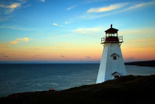 Lighthouse Sunset Coast No Cost Stock Image