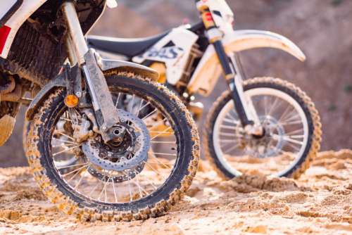 Two motorbikes at a sand quarry details