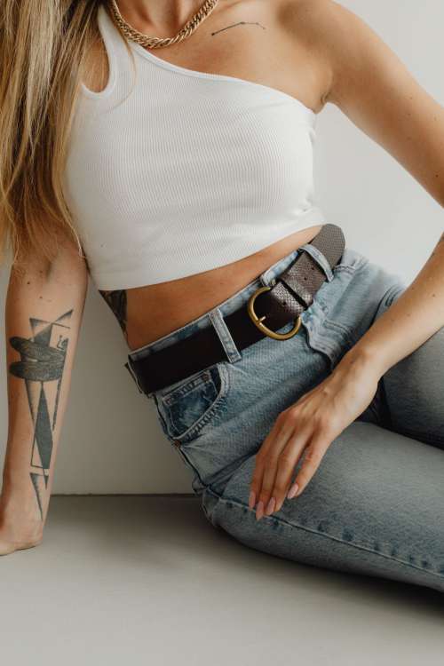 Stylish woman in high waisted wide leg jeans