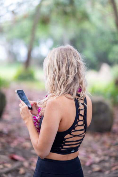 Woman Fitness Phone No Cost Stock Image