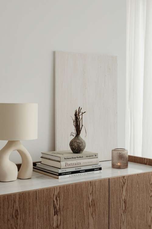 Ceramic lamp styled on a commode with a stone top