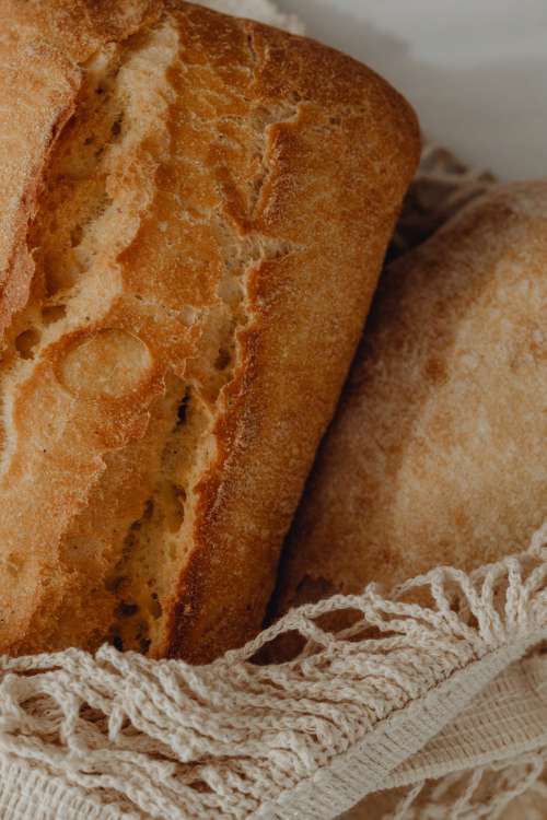 Fresh bread on the kitchen counter - ciabatta - baguette