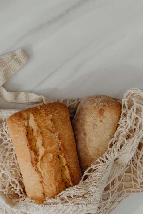 Fresh bread on the kitchen counter - ciabatta - baguette