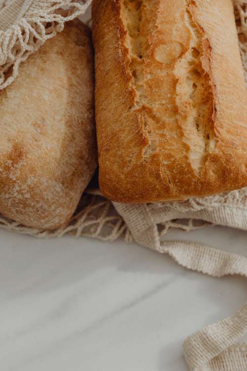 Fresh bread on the kitchen counter - ciabatta - baguette