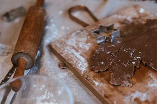 Cutting out gingerbread Christmas biscuits 4