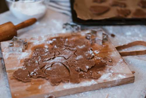 Cutting out gingerbread Christmas biscuits 6